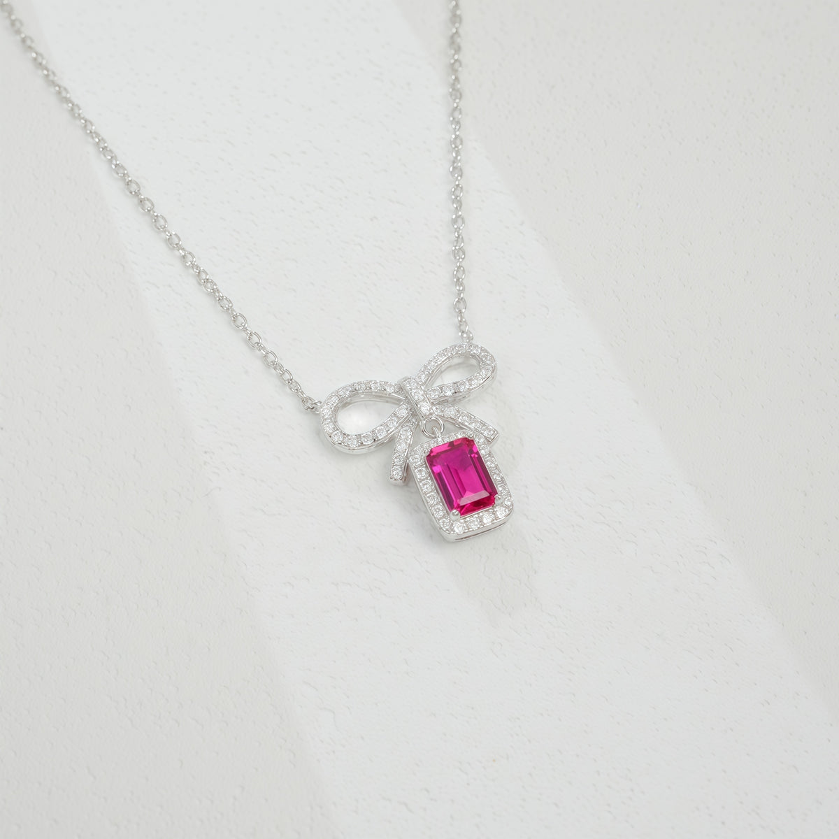 Premium Modern Bow: Radiant Lab-Grown Emerald Ribbon Necklace | S925 Silver