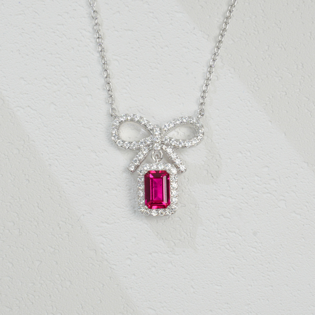 Premium Modern Bow: Radiant Lab-Grown Emerald Ribbon Necklace | S925 Silver