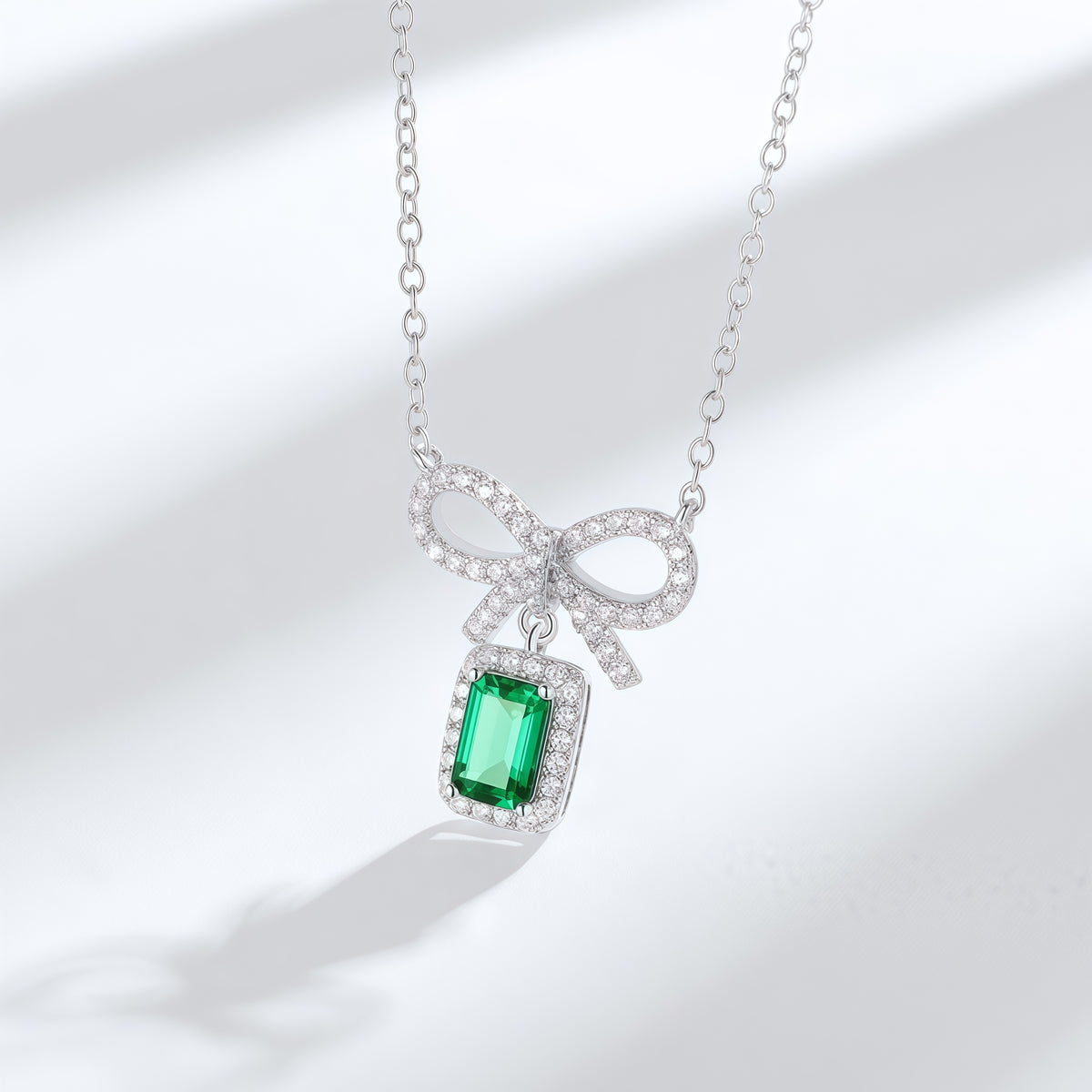 Premium Modern Bow: Radiant Lab-Grown Emerald Ribbon Necklace | S925 Silver