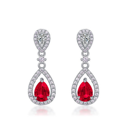 Crystal Dew: Pear-Cut Lab-Grown Emerald Long Drop Earrings | 925 Silver | Dapaza