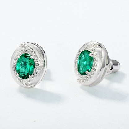 Retro Oval: Minimalist Lab-Grown Emerald Oval Stud Earrings | 925 Silver | Dapaza